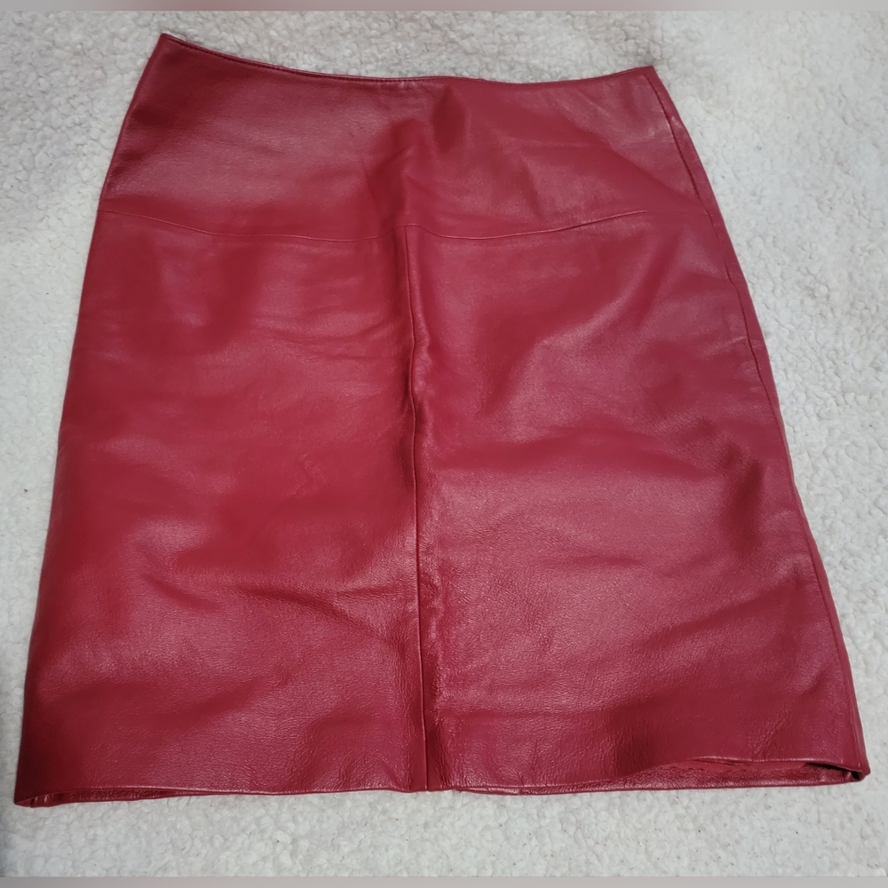 Genuine leather Red pencil skirt  with back slit Size 6. Prestine, worn once